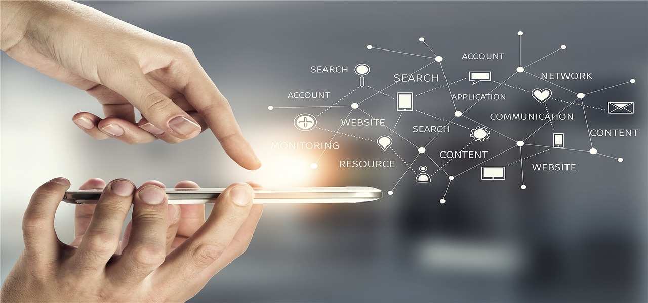 A person using a smartphone connected to digital services, websites and networks